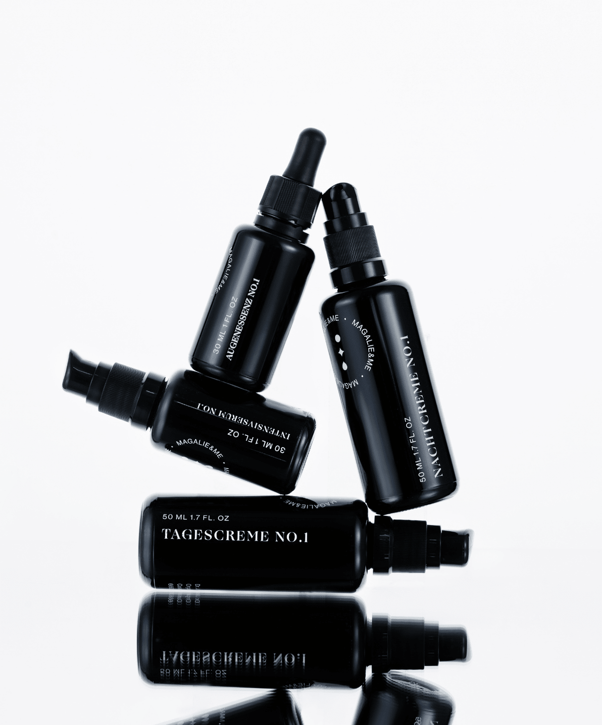 Stack of Magalie&ME bottles including Regenerating Day Cream No. 1